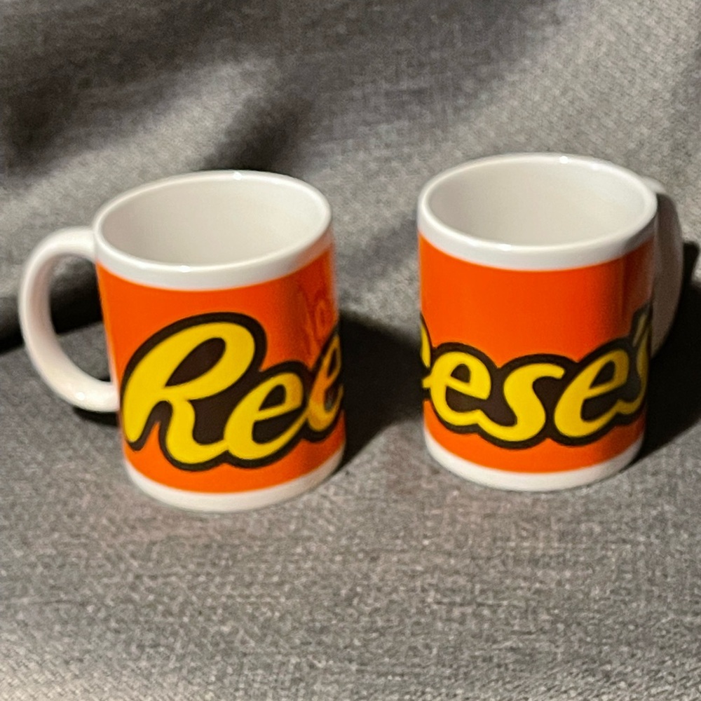 Pair of Reese’s candy mugs.